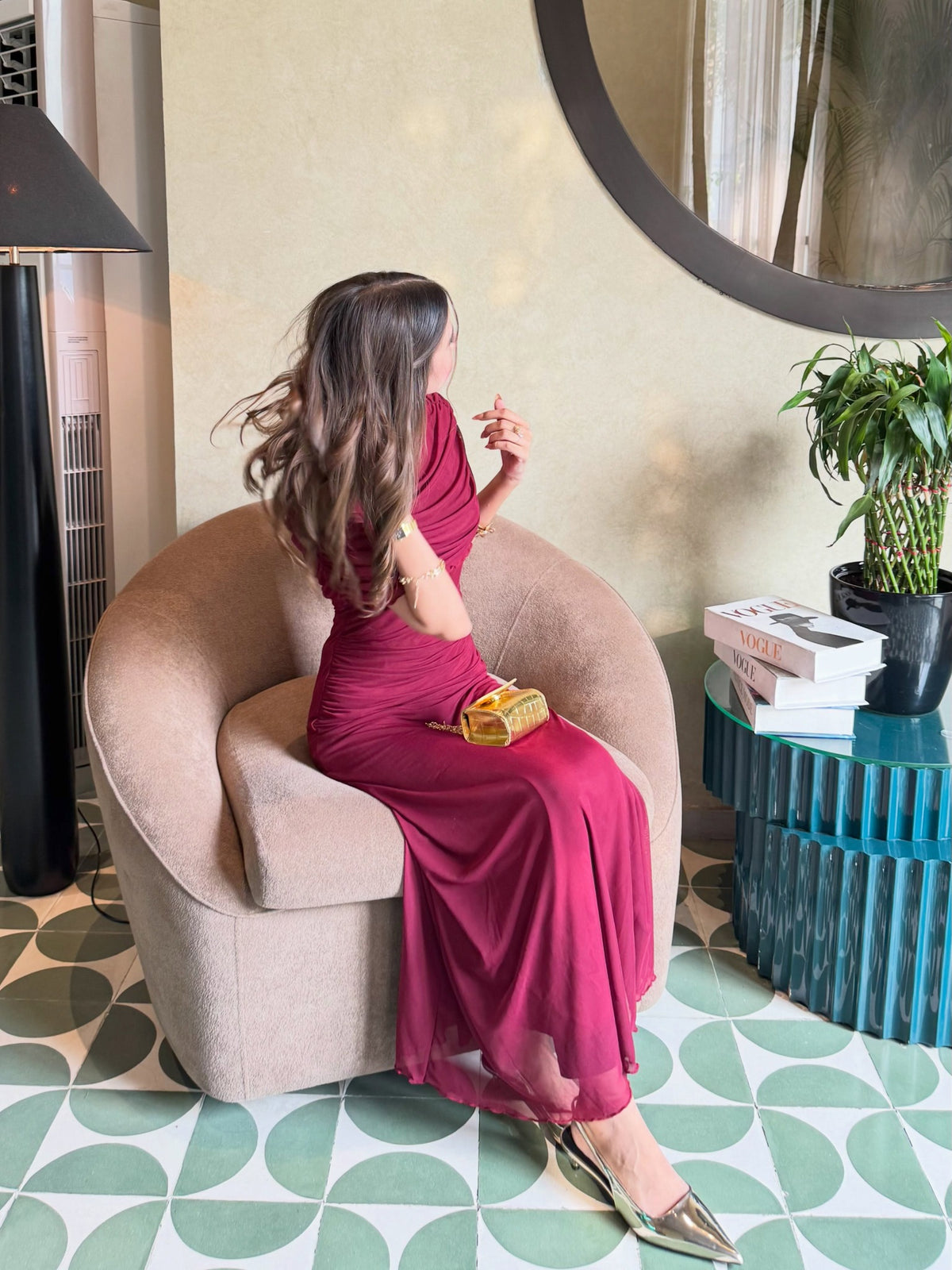Wine burgundy maxi dress, seated full-length view