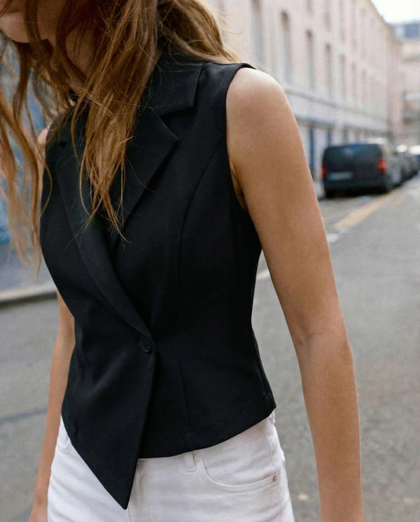 Black tailored sleeveless blazer vest detail view