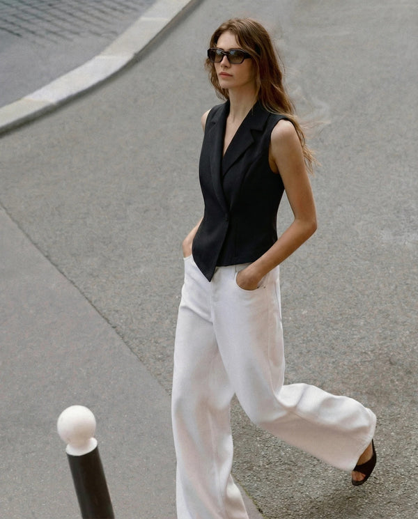 Black tailored sleeveless blazer vest side view